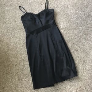 Strappy black satin dress with unique design